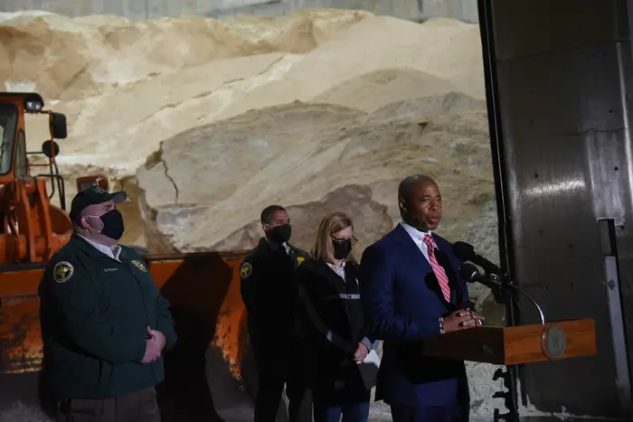 New York City Mayor Eric Adams , NYC Sanitation Commissioner Edward Grayson and NYC Emergency Management First Deputy Commissioner Christina Farrell announce winter weather preparations at the Spring Street Salt Shed in Manhattan